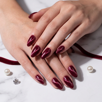 Burgundy Cat Eye Almond Nails