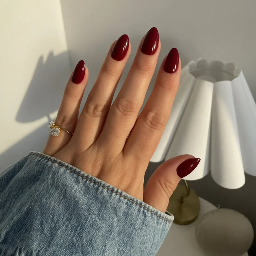 Glossy Maroon Almond Nails