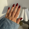 Glossy Maroon Almond Nails