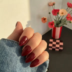 Glossy Maroon Almond Nails
