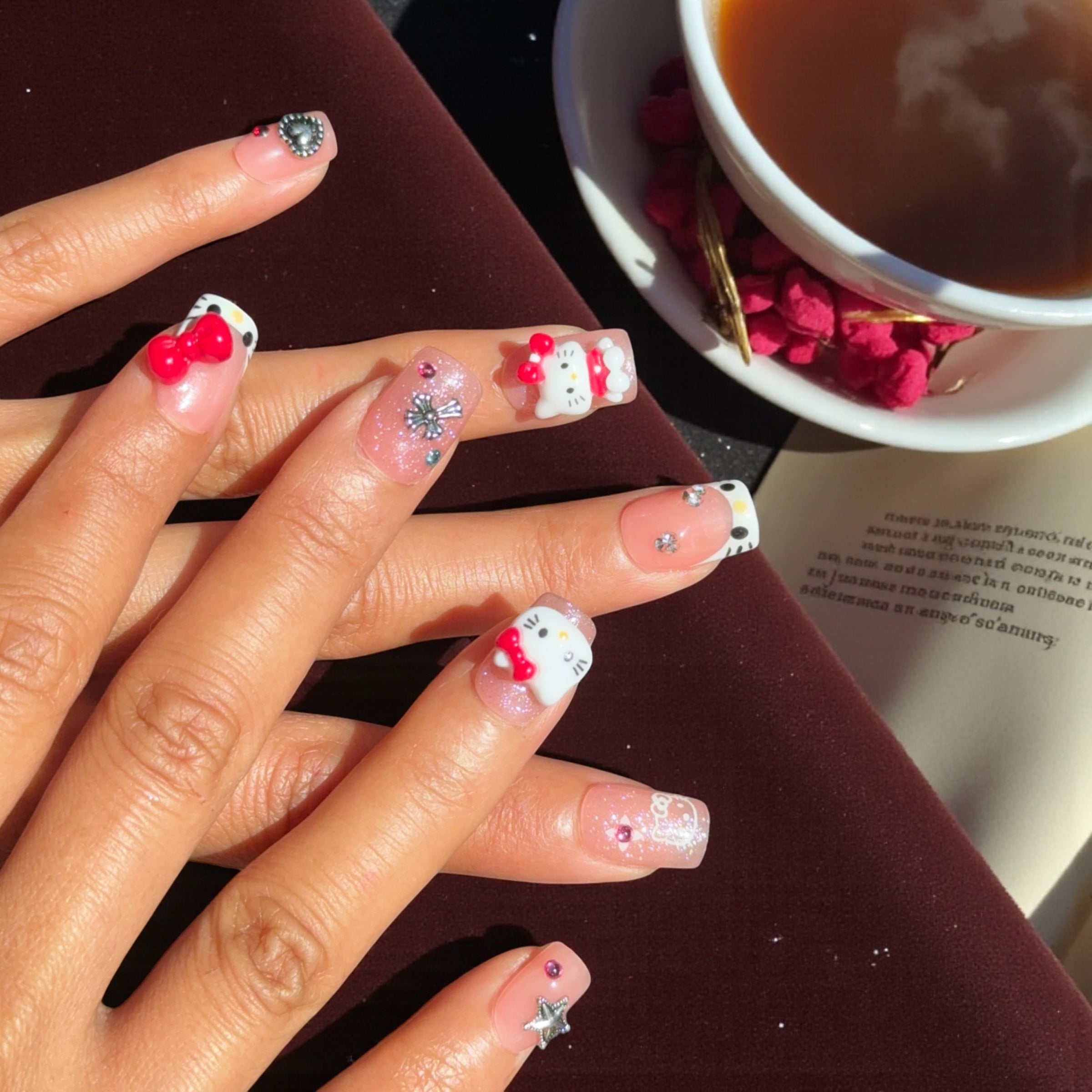 short red Hellokitty Nails
