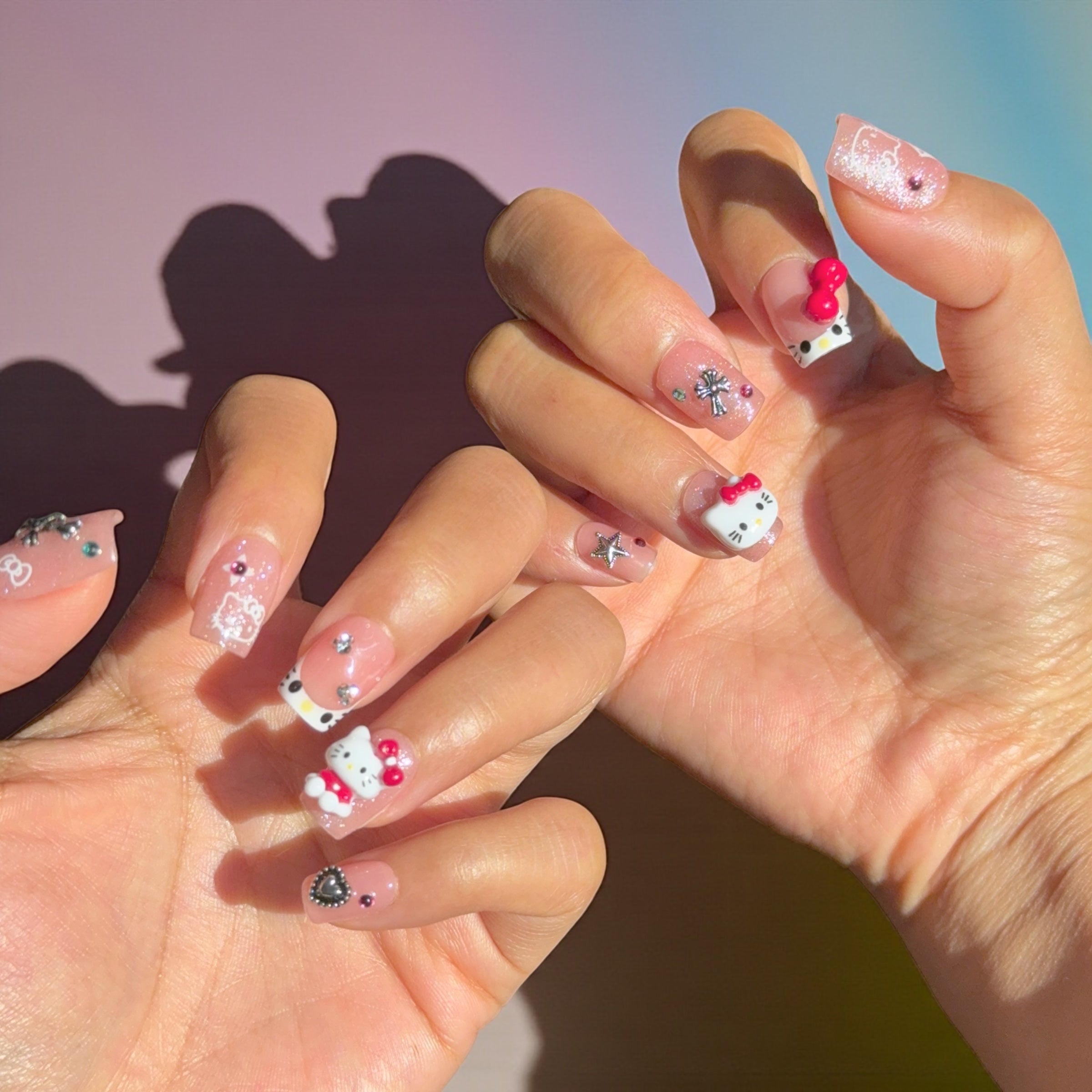 short red Hellokitty Nails